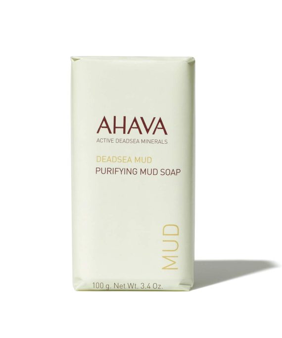 A bar of AHAVA Dead Sea Purifying Mud Soap, featuring anti-bacterial and oil-free formula for deep cleansing and refreshing the skin.