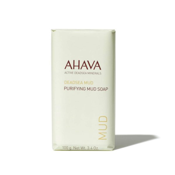 A bar of AHAVA Dead Sea Purifying Mud Soap, featuring anti-bacterial and oil-free formula for deep cleansing and refreshing the skin.
